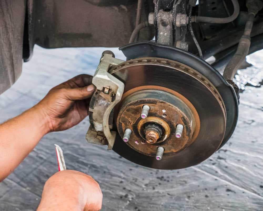 Logo AUTO PEÇAS - TOP TRUCK MOLAS